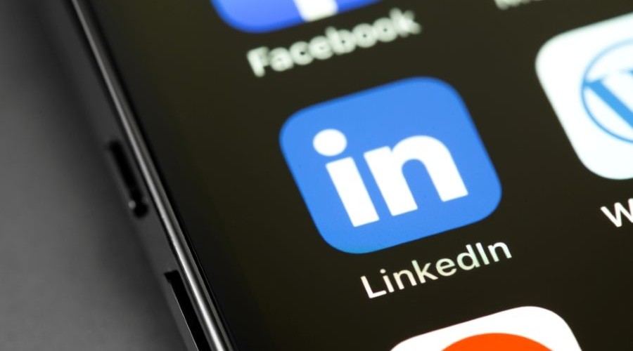 LinkedIn mobile icon app on a smartphone_shutterstock_2303380705 900x500