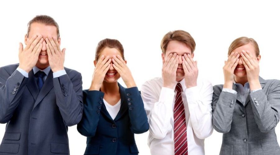 business people covering their eyes_shutterstock_53252035 900x500