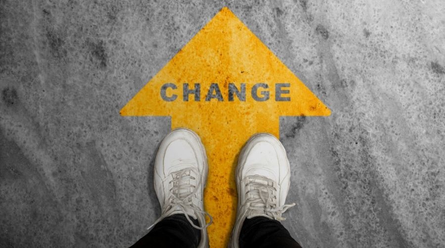 the word change in yellow arrow_shutterstock_2420548893 900x500
